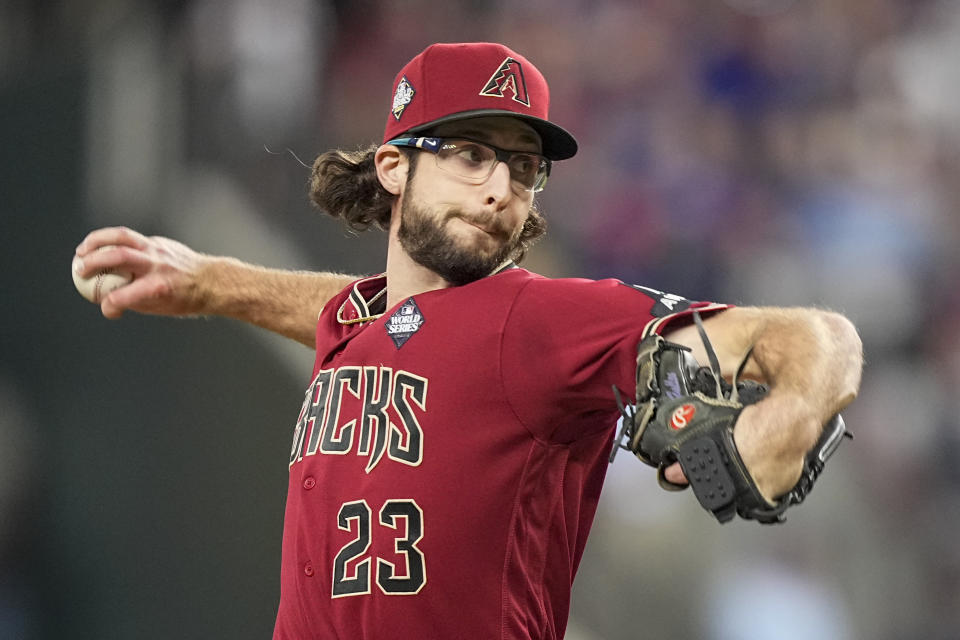 Arizona Diamondbacks starting pitcher Zac Gallen throws against the Texas Rangers during the first inning in Game 1 of the baseball World Series Friday, Oct. 27, 2023, in Arlington, Texas. (AP Photo/Brynn Anderson)