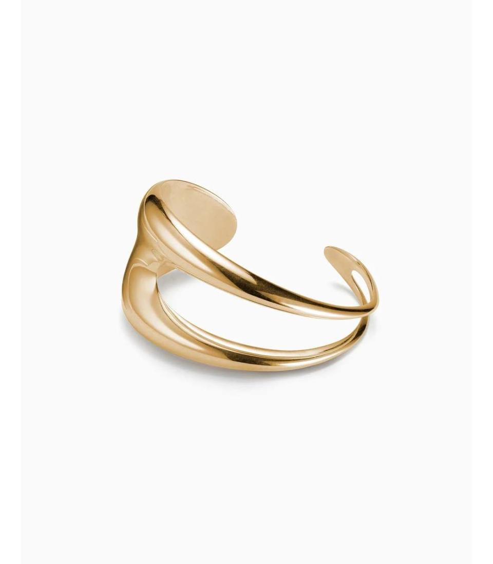 <p><strong>Agmes</strong></p><p>harpersbazaar.com</p><p><strong>$830.00</strong></p><p><a href="https://shop.harpersbazaar.com/designers/agmes/leona-gold-cuff-bracelet-91984.html" rel="nofollow noopener" target="_blank" data-ylk="slk:Shop Now;elm:context_link;itc:0;sec:content-canvas" class="link ">Shop Now</a></p>