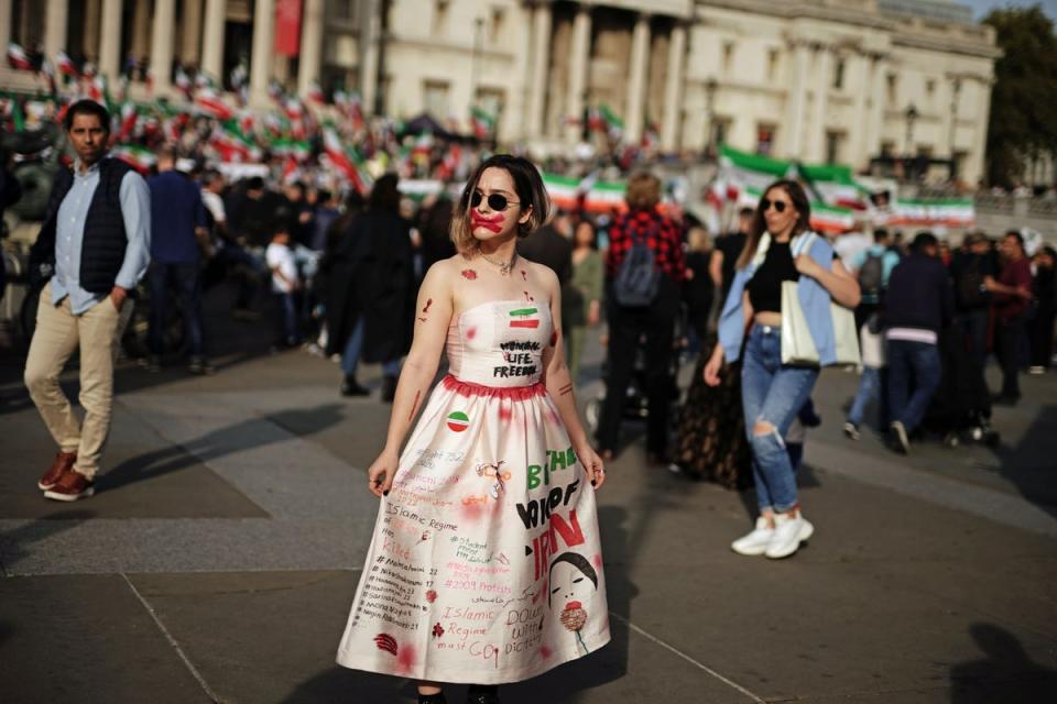 Participants take part in a demonstration in Trafalgar Square, London over the death of Iranian Mahsa Amini (PA) (PA Wire)