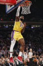 Los Angeles Lakers forward LeBron James (23) dunks with no one around defending him during the first half of an NBA basketball game against the New York Knicks in New York, Wednesday, Jan. 22, 2020. (AP Photo/Kathy Willens)