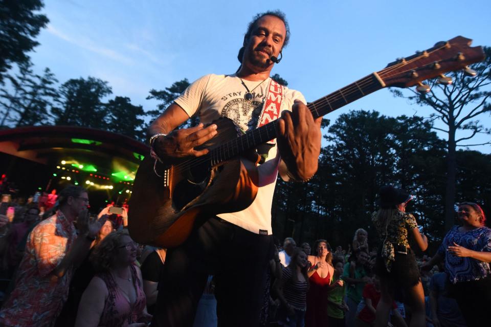 Michael Franti & Spearhead perform at the Greenfield Lake Amphitheater in 2018.   [Matt Born/StarNews Photo]