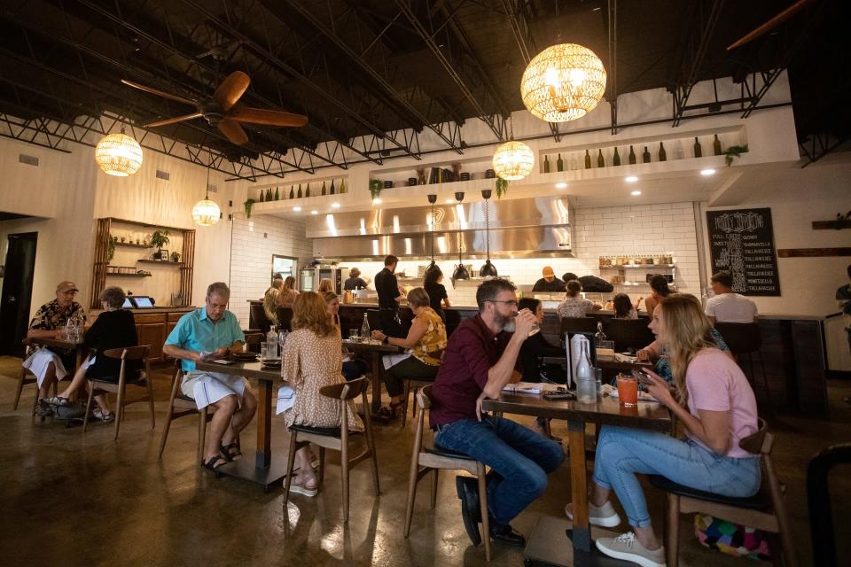 People dine at Black Radish in Tallahassee, Fla. on Friday, July 15, 2022. 