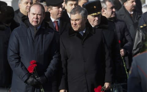 Mr Putin's chief of staff Anton Vaino, left, who US intelligence said spoke with Mr Prigozhin before the attack, attends a Defender of the Fatherland Day ceremony on Friday - Credit: Mikhail Metzel/TASS via Getty Images