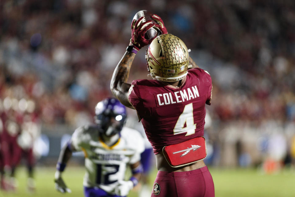 Nov 18, 2023; Tallahassee, Florida, USA; Florida State Seminoles wide receiver Keon Coleman (4) catches a ball in the endzone to score a touchdown against the North Alabama Lions during the third quarter at Doak S. Campbell Stadium. Mandatory Credit: Morgan Tencza-USA TODAY Sports