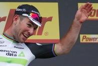 Cycling - Tour de France cycling race - The 223,5-km (139 miles) Stage 3 from Granville to Angers, France - 04/07/2016 - Team Dimension Data rider Mark Cavendish of Britain reacts on podium after winning the stage. REUTERS/Juan Medina