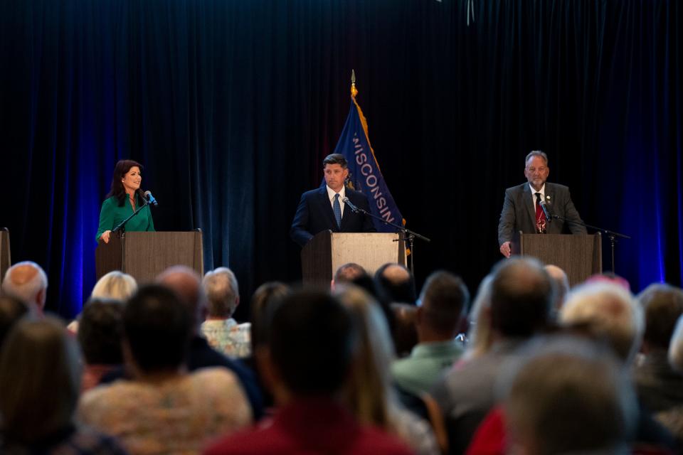 From left to right, Rebecca Kleefisch, Kevin Nicholson and Timothy Ramthun during the Wisconsin Gubernatorial Primary Debate on Monday, June 27, 2022 at Providence Academy in Green Bay, Wis.