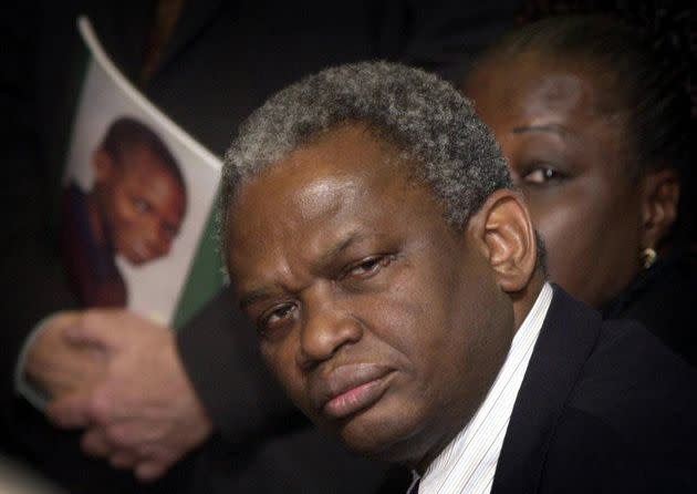 Richard and Gloria Taylor, mother of murdered school boy Damilola who was killed in Peckham, south London November 2000, at a press conference in Scotland Yard to coincide with the release of an eight-month inquiry by John Sentamu,  * ... the Bishop of Birmingham. The review made a total of 23 recommendations in relation to the police criminal justice system and prison service, and although the review acknowledged that the Metropolitan Police had moved on since the botched Stephen Lawrence inquiry in 1993, it made a series of criticisms, particularly of the way the Crown's 14-year-old child witness known as 'Bromley' was dealt with.