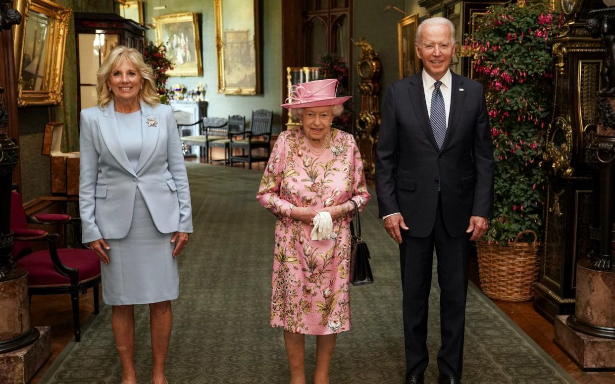 The Queen is flanked by Jill and Joe Biden in the Grand Corridor at Windsor Castle. He is the 13th president she has met.  - Steve Parsons/ PA Pool