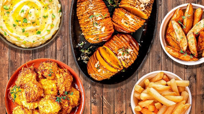 Potato dishes on wooden background