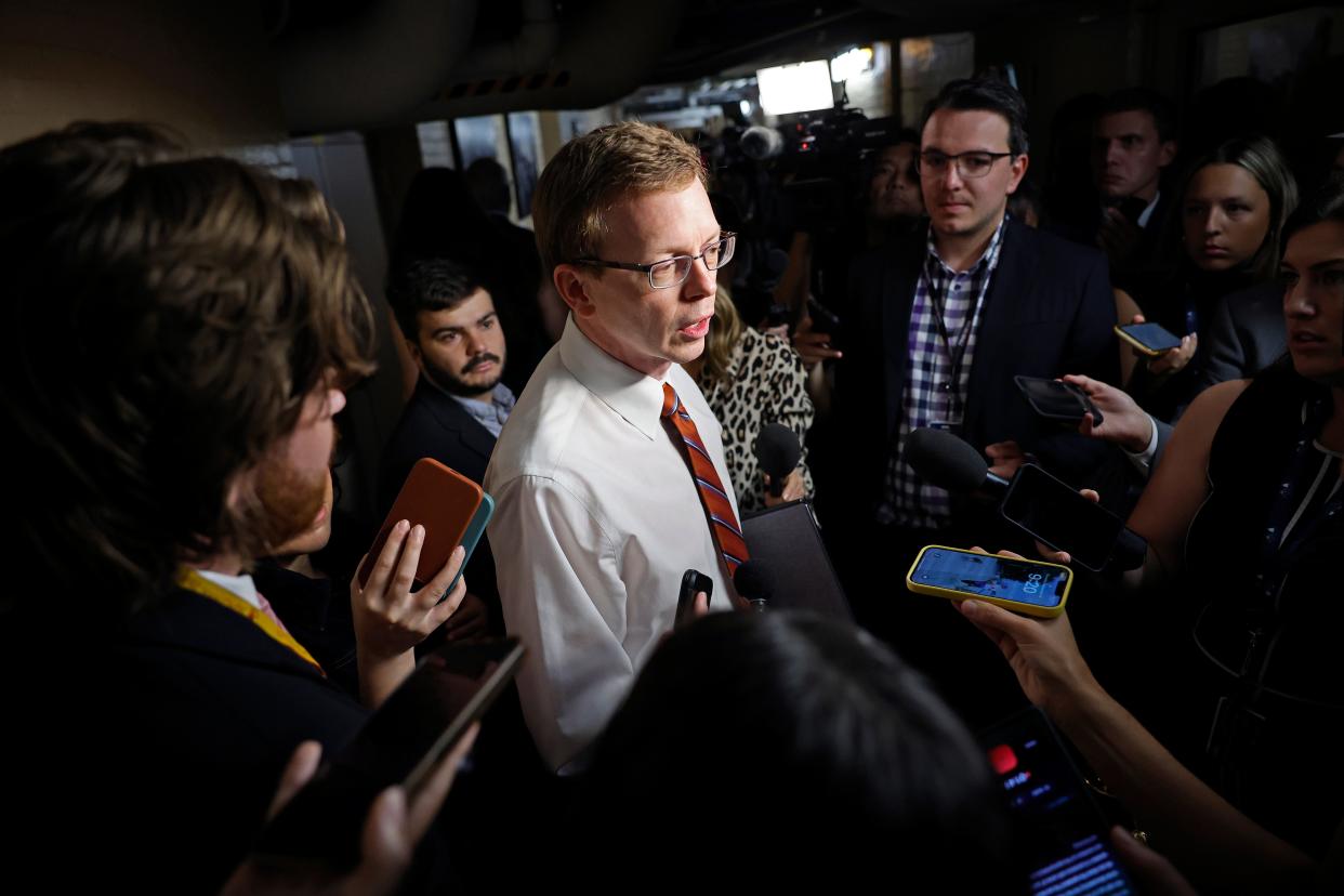 Rep. Dusty Johnson, R-S.D., talks to reporters following a Republican caucus meeting in the basement of the U.S. Capitol on September 14, 2023 in Washington, DC.