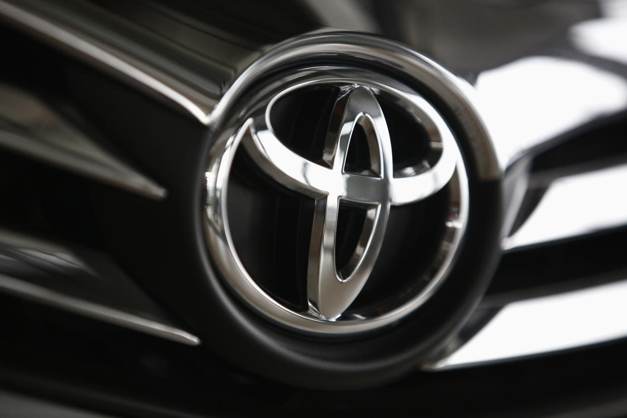 File Photo: A Toyota logo is seen on a car inside a showroom at a Toyota dealership in Warsaw April 11, 2014. Toyota Motor Corp announced that it would call back 3.4 million vehicles globally. REUTERS/Kacper Pempel