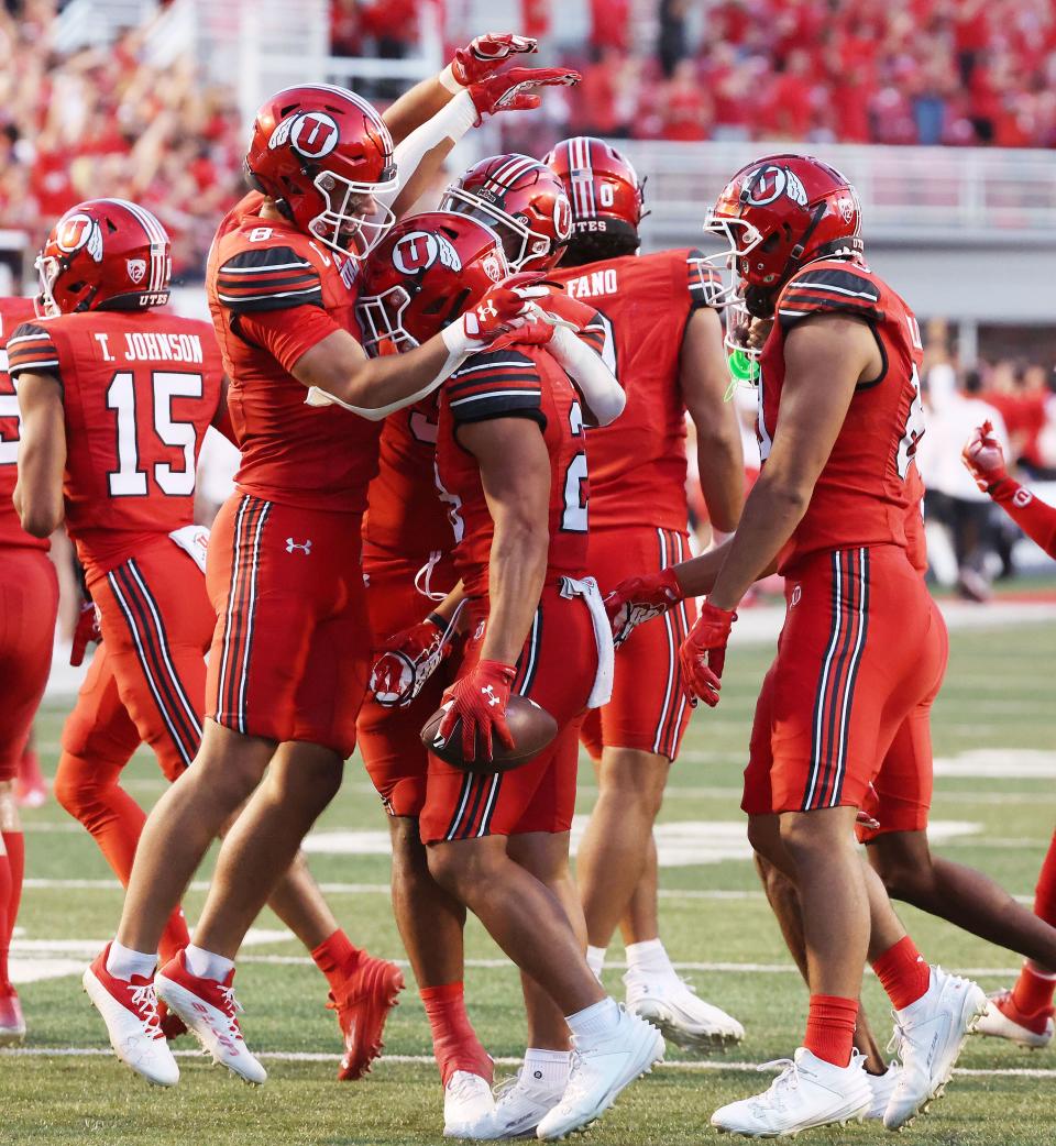 Utah Utes safety Sione Vaki (28) celebrates after intercepting the ball against the Florida Gators in Salt Lake City on Thursday, Aug. 31, 2023 during the season opener. Utah won 24-11. | Jeffrey D. Allred, Deseret News