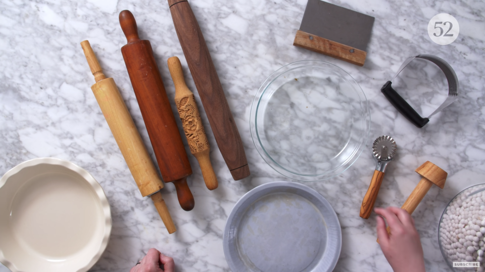 This might seem obvious, but you want to have all of your equipment readily accessible once you start working with your dough, because the butter will start to melt right away. Key tools include your pie dish, a rolling pin, a dough/bench scraper, and pie weights.