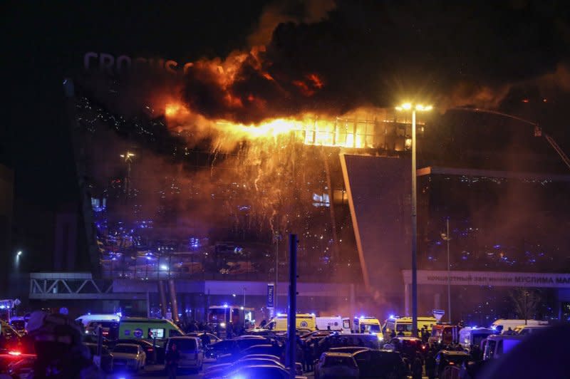 Fire rises above the burning Crocus City Hall concert venue following an attack by gunmen in Krasnogorsk, outside Moscow late Friday. ISIS later issued a statement claiming responsibility. Photo by Vasily Prudnikov/EPA-EFE