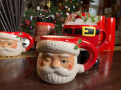 In this Wednesday, Dec. 4, 2019 photo, a bad Santa cocktail is displayed at the Miracle pop up bar in the Henrietta hotel in London. While mulled wine, warm spiced cider and hot toddies have long been British staples during winter many cocktail bars in London offer their own seasonal winter warmers. (AP Photo/Louise Dixon)