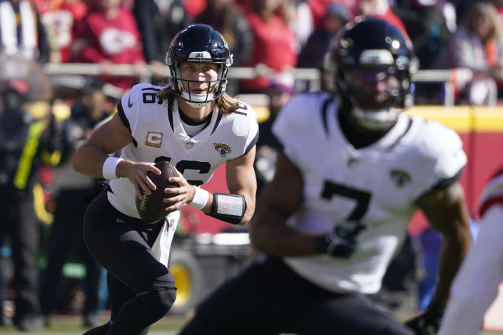 Jacksonville Jaguars quarterback Trevor Lawrence (16) drops back to pass during the first half of an NFL football game against the Kansas City Chiefs Sunday, Nov. 13, 2022, in Kansas City, Mo. (AP Photo/Ed Zurga)