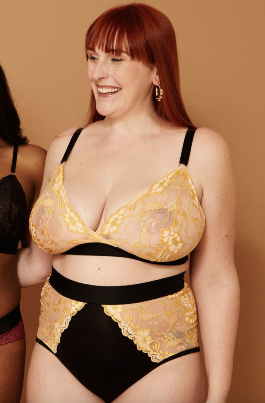 plus size red head model in black and Marigold Yellow Lace Bralette (Photo via Etsy)