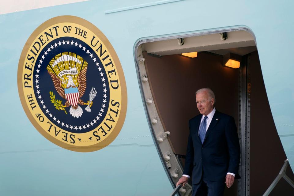 President Joe Biden steps off Air Force One at Portsmouth International Airport at Pease in Portsmouth, N.H., Tuesday, April 19, 2022.