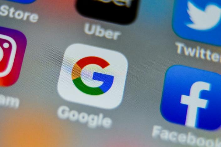 Critics of Big Tech are seeking to strip legal immunity from online platforms by reforming a law, but some analysts say the move threatens the basis for an open internet (AFP Photo/DENIS CHARLET)