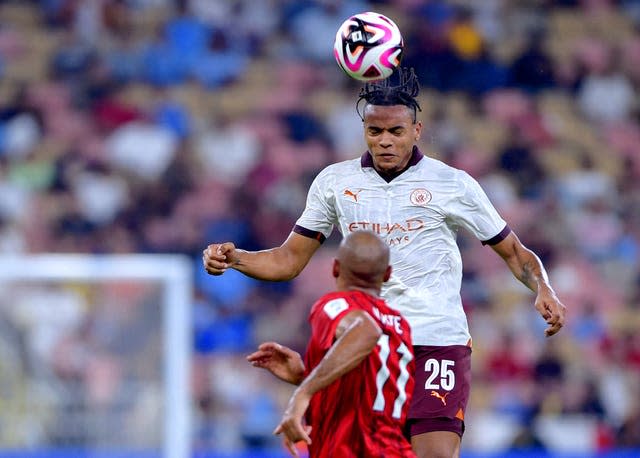 Manchester City’s Manuel Akanji heads the ball during (PA)