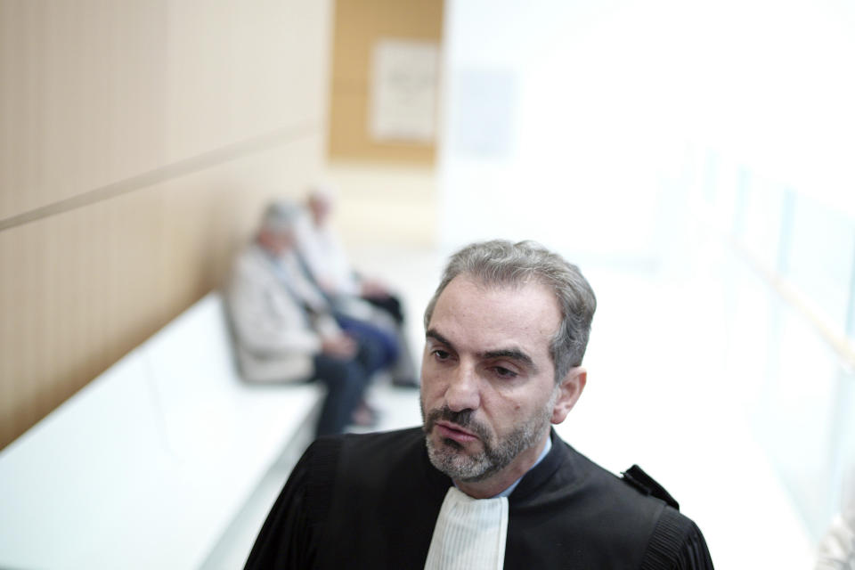 The plumber's lawyer Georges Karouni, speaks to the press at the courthouse, in Paris, Thursday, Sept. 12, 2019. The only daughter of Saudi Arabia's King Salman has been found guilty by a Paris court of charges that she ordered her bodyguard to detain and strike a plumber for taking photos at the Saudi royal family's apartment in the French capital. (AP Photo/Thibault Camus)