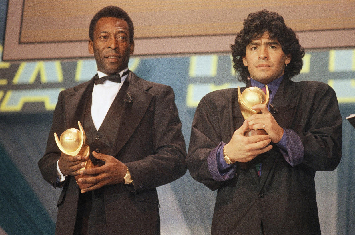 Pele and Maradona seen together in Italy in March 1987 as they received the trophy of “Sports Oscar” for their performance in the soccer fields. (AP Photo/Milan)