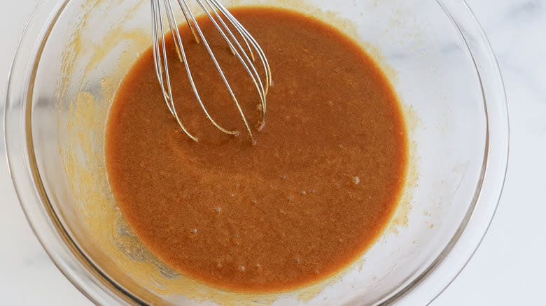 whisking wet ingredients in bowl