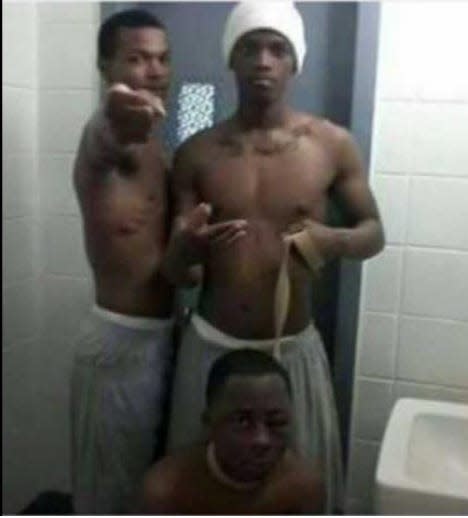 FILE - A photo of Cortez Berry, 18, went viral on social media, which shows him being held captive by cellmates in 2015. Berry was an inmate at the Burruss Correctional Training Center at the time.