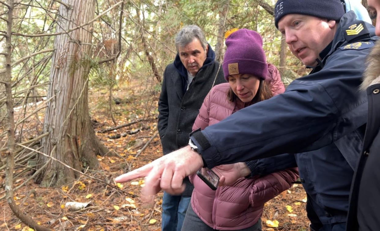 RCMP Sgt. Eric Page showed Ashley Simpson's family where her remains were found by investigators in 2021, on Monday, Oct. 30, 2023.  (Brady Strachan/CBC - image credit)