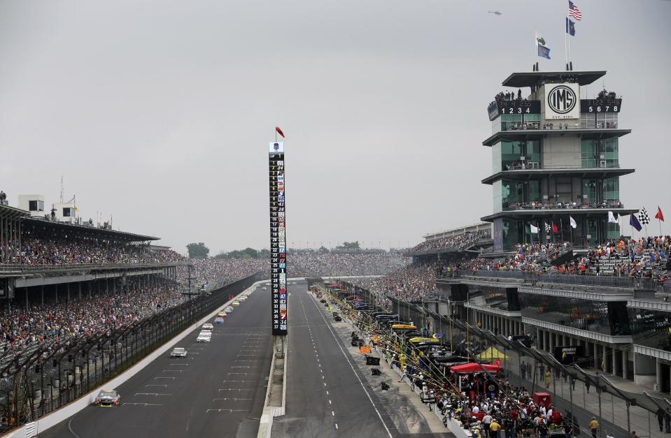 Jeff Gordon drives into Turn 1 during the Brickyard 400 auto race at Indianapolis Motor Speedway in Indianapolis, Sunday, July 27, 2014. (AP Photo/AJ Mast)