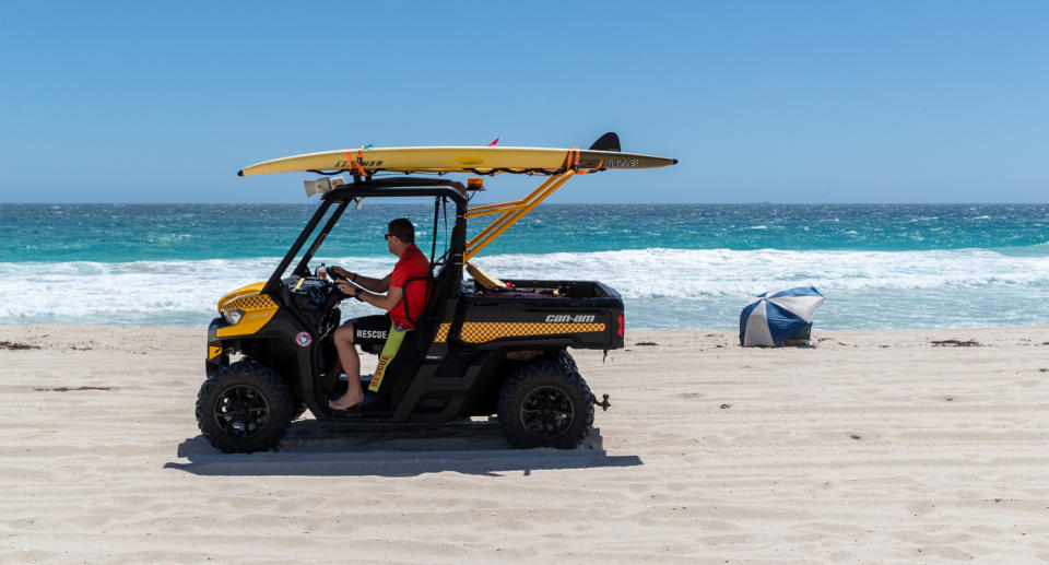 The body was found early Sunday morning on Scarborough Beach in Western Australia (pictured). Source: AAP