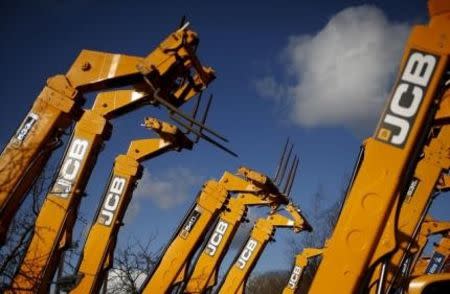 JCB Machinery stands for sale in the yard of a dealership near Manchester, northern England, March 3, 2015. Picture taken March 3, 2015. REUTERS/Phil Noble