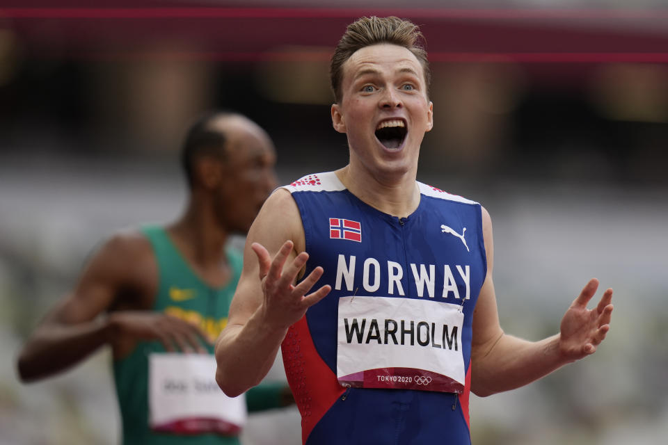 Karsten Warholm, of Norway, reacts after winning the men's 400-meter hurdles final at the 2020 Summer Olympics, Tuesday, Aug. 3, 2021, in Tokyo. (AP Photo/Petr David Josek)