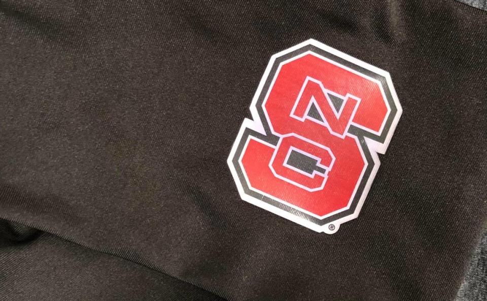 If you can’t get to N.C. State’s campus to visit Wolfpack Outfitters ahead of the NCAA Final Four, local thrift shops are good places to hunt for used NCSU items like this sports waist bag.
