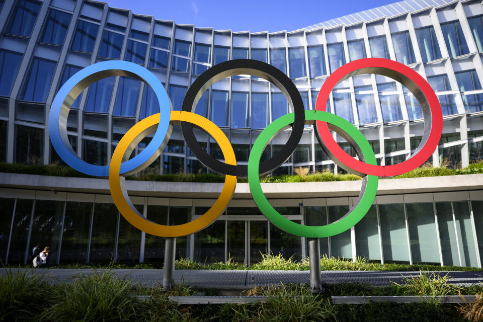 Olympic Rings are pictured in front of The Olympic House, headquarters of the International Olympic Committee (IOC) at the opening of the executive board meeting of the International Olympic Committee (IOC), in Lausanne, Switzerland, Thursday, September 8, 2022. (Laurent Gillieron/Pool via AP)