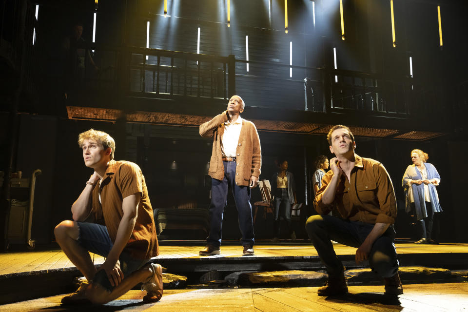 This image released by Boneau/Bryan-Brown shows John Cardoza, from left, Dorian Harewood and Ryan Vasquez during a performance of "The Notebook" in New York, the new musical based on the bestselling novel by Nicholas Sparks that inspired the iconic film. (Julieta Cervantes/Boneau/Bryan-Brown via AP)