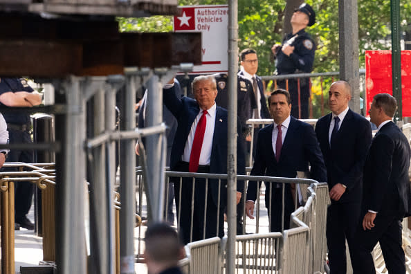 Former US President Donald Trump arrives at Manhattan Criminal Court as he attends the first day of his trial for allegedly covering up hush money payments linked to extramarital affairs, in New York City on April 15, 2024. Trump goes to court Monday as the first US ex-president ever to be criminally prosecuted, a seismic moment for the United States as the presumptive Republican nominee campaigns to re-take the White House. The scandal-plagued 77-year-old is accused of falsifying business records in a scheme to cover up an alleged sexual encounter with adult film actress Stormy Daniels to shield his 2016 election campaign from adverse publicity. (Photo by Adam GRAY / AFP) (Photo by ADAM GRAY/AFP via Getty Images)