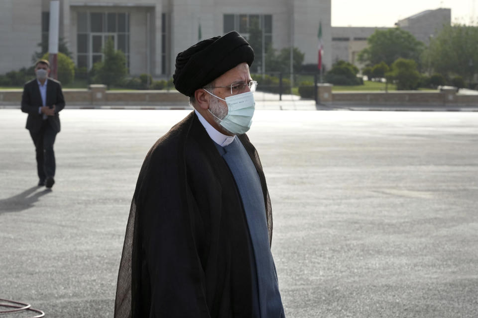 Iranian President Ebrahim Raisi leaves Tehran's Mehrabad airport for a trip to Oman, Monday, May, 23, 2022. (AP Photo/Vahid Salemi)