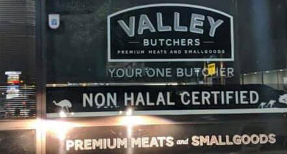 A sign on Valley Butchers' storefront in Adelaide reads, 'non halal certified' with pictures of kangaroos and an emu.