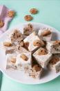 <p>If it's good enough for Santa, it's good enough for you. </p><p>Get the recipe from <a href="https://www.delish.com/cooking/recipe-ideas/recipes/a58543/milk-n-cookies-fudge-recipe/" rel="nofollow noopener" target="_blank" data-ylk="slk:Delish;elm:context_link;itc:0;sec:content-canvas" class="link ">Delish</a>. </p>