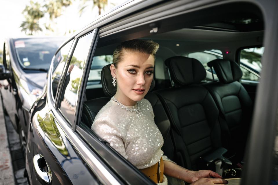 Amber Heard leaves the Martinez Hotel during the 72nd annual Cannes Film Festival on May 15, 2019 in Cannes, France.
