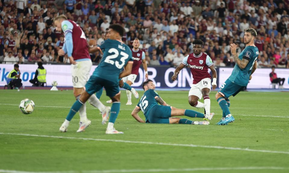 <span>Mohammed Kudus’s shot deflects off Jarrod Bowen (left) and into the net for West Ham’s winner against Bournemouth.</span><span>Photograph: Rob Newell/CameraSport/Getty Images</span>