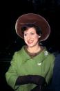 <p>Princess Margaret wore a brown hat, green coat, and jeweled brooch to the 1965 opening of the Word Blind Centre in Bloomsbury, London.</p>