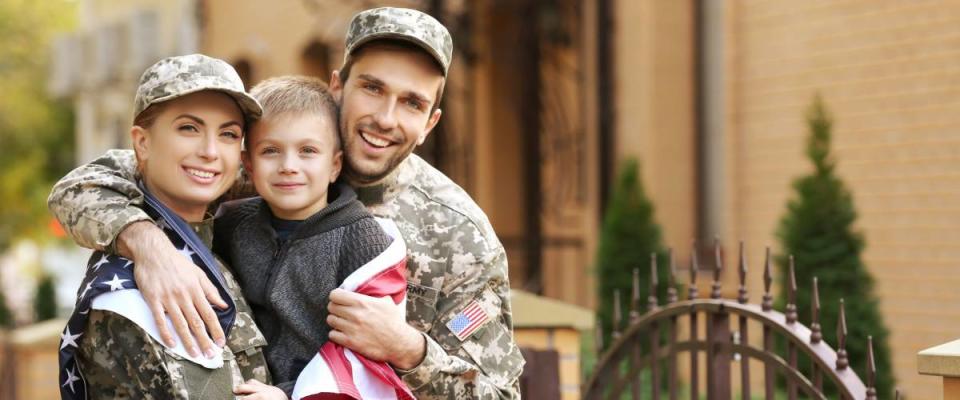 Military family reunited on a sunny day