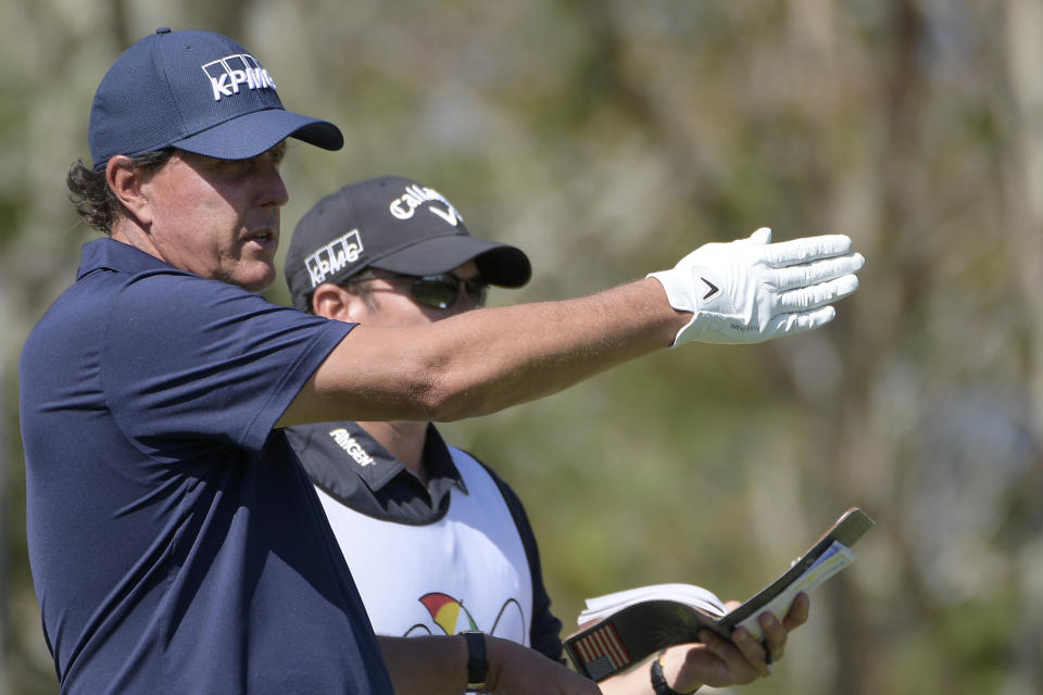 Phil Mickelson lines up a tee shot on the third hole during the second round of the Arnold Palmer Invitational golf tournament at Bay Hill, Friday, March 8, 2019, in Orlando, Fla. (AP Photo/Phelan M. Ebenhack)