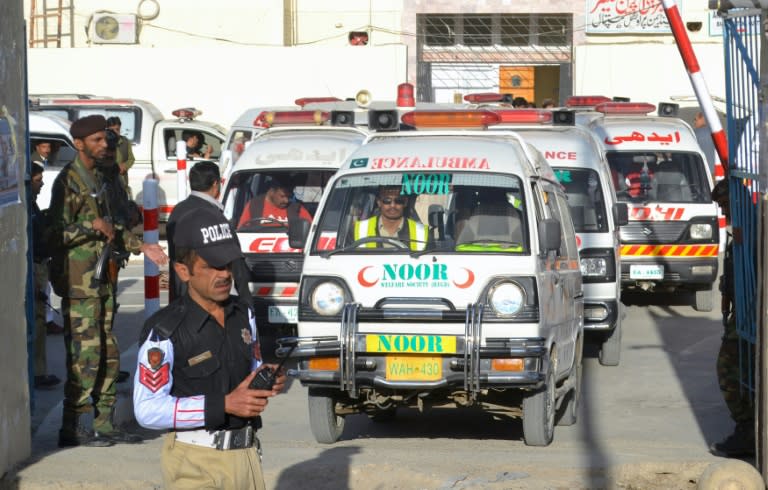 An ambulance transports the bodies of victims of an attack on the Balochistan Police College on October 25, 2016