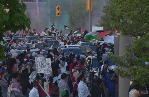 Protesters moved onto Burnhamthorpe Road, where they blocked traffic.