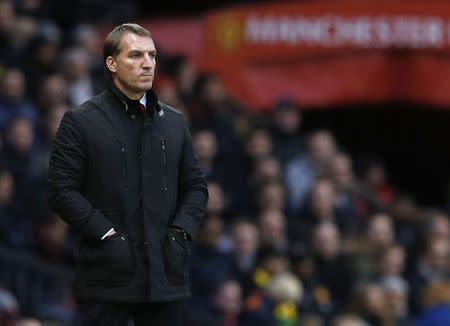 Liverpool manager Brendan Rodgers watches play during their English Premier League soccer match against Manchester United at Old Trafford in Manchester, northern England December 14, 2014. REUTERS/Phil Noble