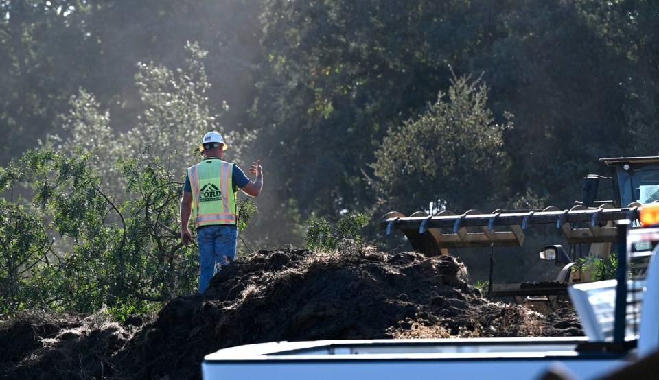 Crew begins work on a fishery restoration project along the Stanislaus River at Kerr Park in Oakdale, Calif., Tuesday, Oct. 3, 2023.