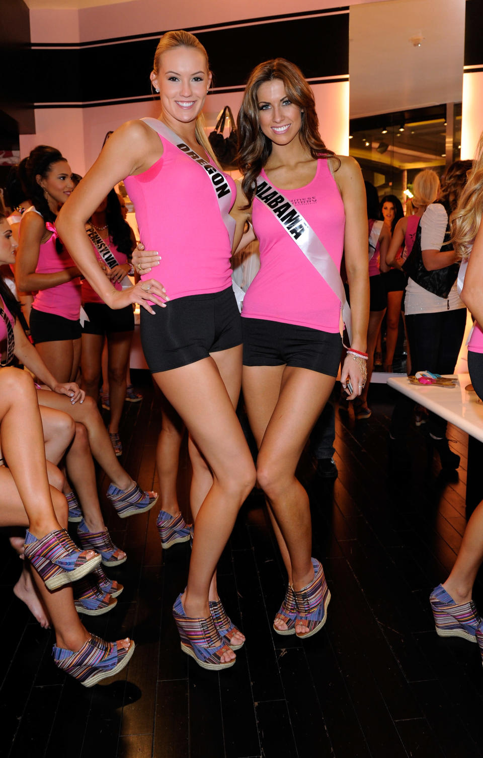 Miss Orgeon USA Alaina Bergsma (L) and Miss Alabama USA Katherine Webb appear at the Chinese Laundry before competing in the Miss USA 2012 Wedge Run at the Planet Hollywood Resort & Casino on May 22, 2012 in Las Vegas, Nevada. (Photo by David Becker/Getty Images For Chinese Laundry)